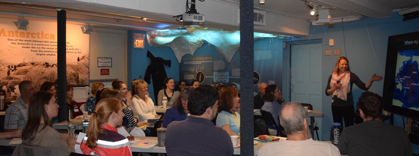 Amy Apprill, far right, gives a presentation to teachers in May 2018 about corals, symbionts, and healthy ecosystems.