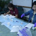 Jennie Rheuban and Sheron Luk processing water samples