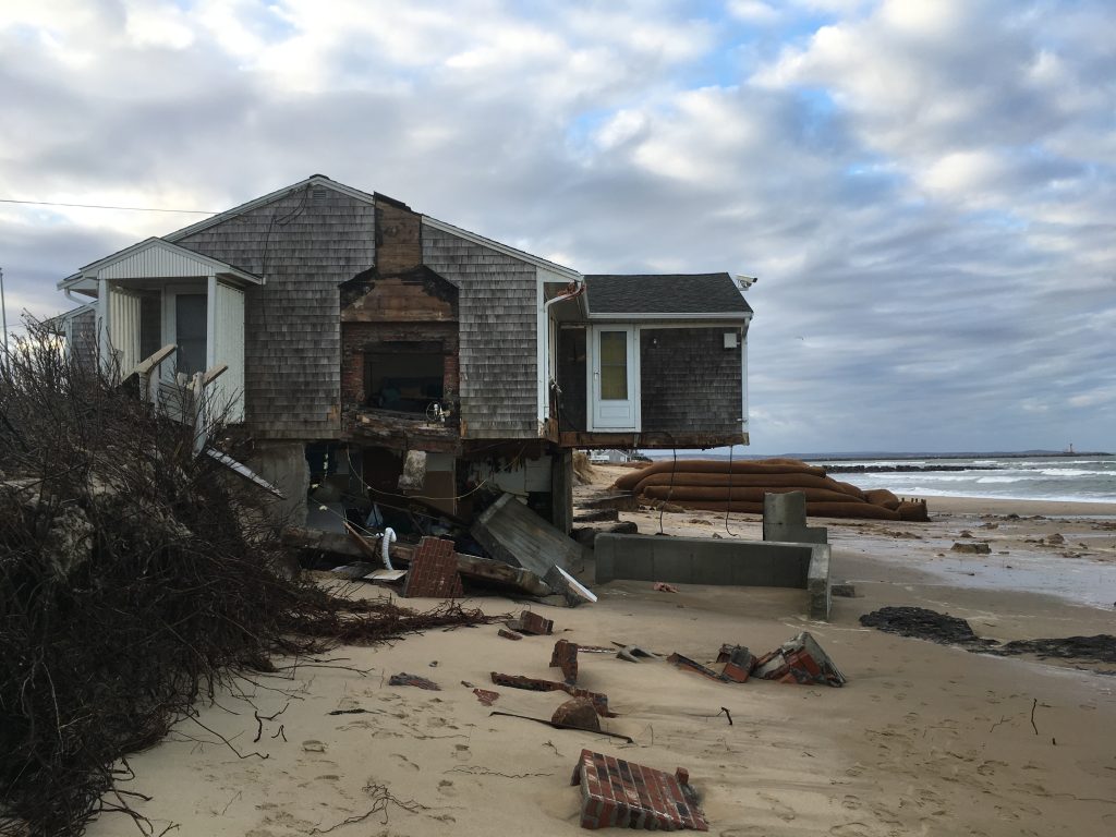 Damaged house on a beach at Town Neck, Sandwich