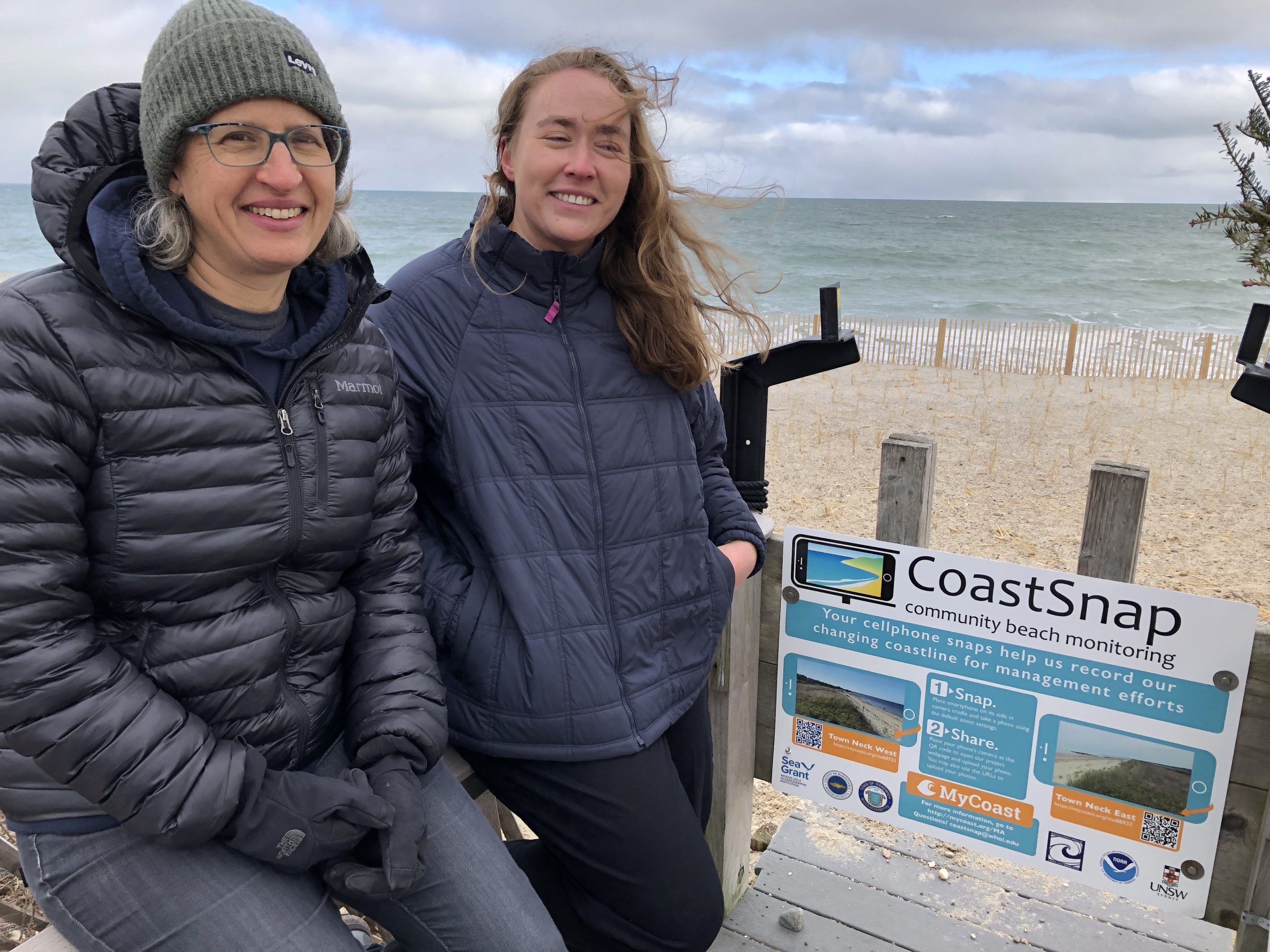 WHOI scientist Sarah Das, left, and graduate student Rilee Thomas at the Town Neck Beach CoastSnap station in Sandwich, MA.