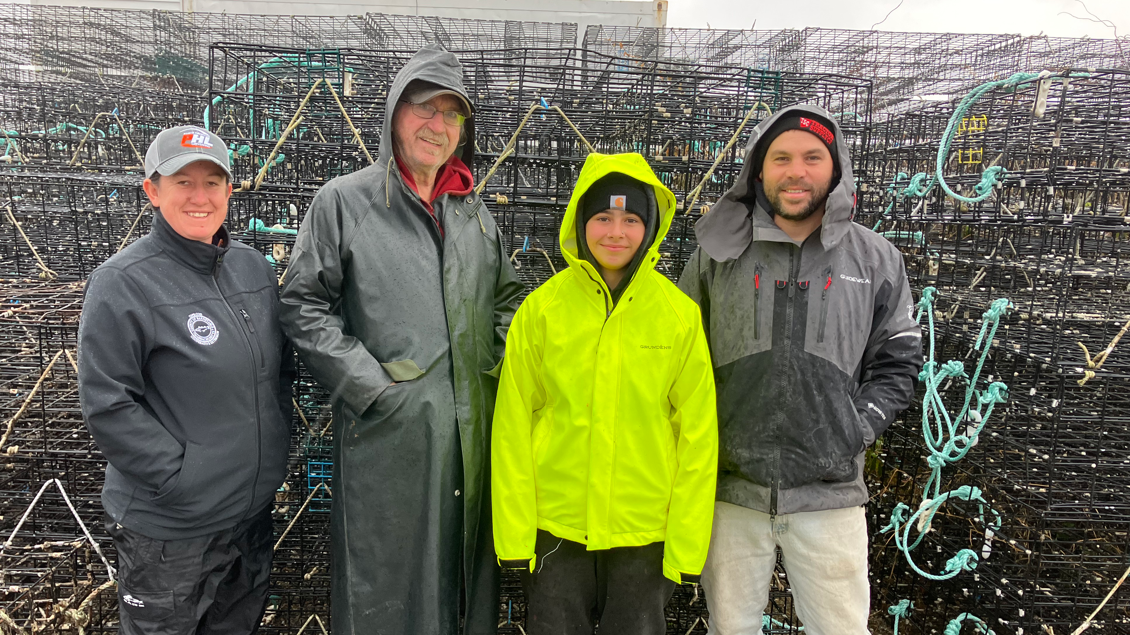 WHOI Sea Grant extension agent Rachel Hutchinson, with Dale Leavitt, owner of West Island Oysters, with intern Alicia Perez and farm manager Travis Ortega.